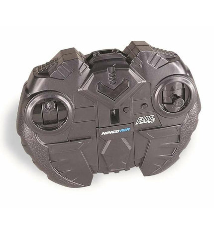 Ninco Air Flog 2 infrared remote control helicopter toy flying in the air, with detailed helicopter design and remote controller visible