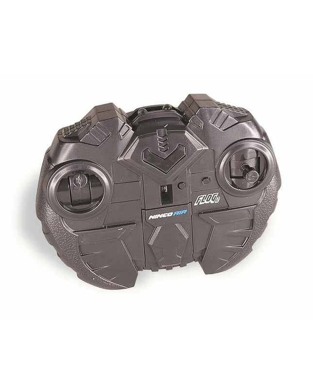 Ninco Air Flog 2 infrared remote control helicopter toy flying in the air, with detailed helicopter design and remote controller visible