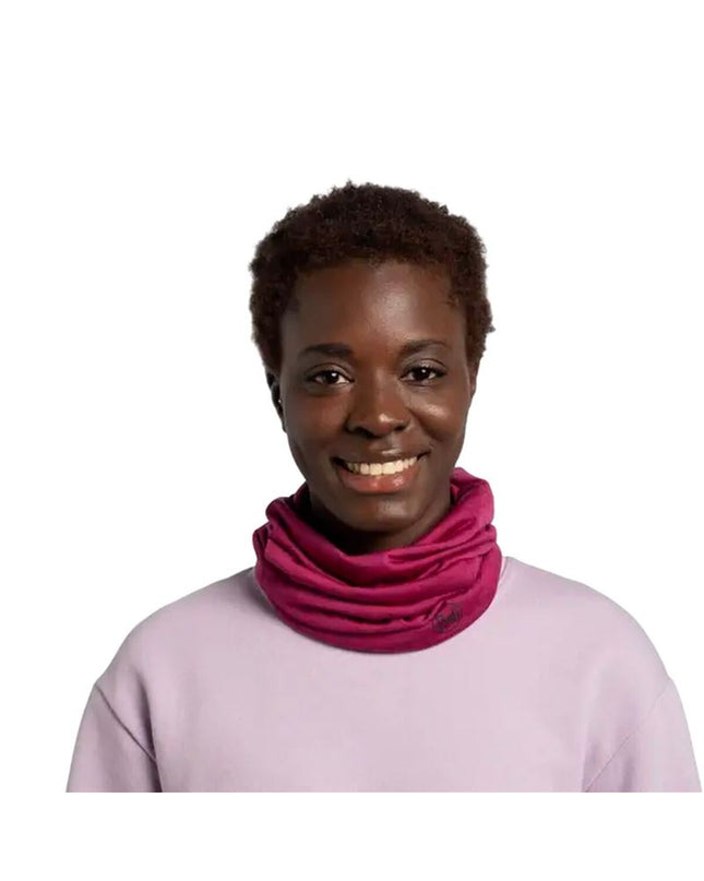 Buff Nekwarmer Buff Merino lightweight magenta-brown neck warmer for outdoor camping and hiking, made of soft merino wool.