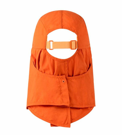Buff Heren Pet Solid Ginger S/M outdoor sport buff worn by a man, featuring a vibrant orange color for outdoor activities.
