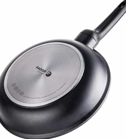 Fagor ALUTHERM 26 black cookware pan for home cooking, featuring a sturdy handle and non-stick surface in a modern kitchen setting.