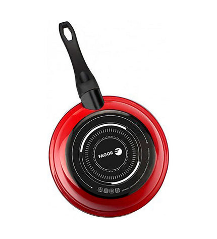 Fagor red cookware set with pots and pans, kitchen and cooking utensils, stacked on a countertop with a modern kitchen background