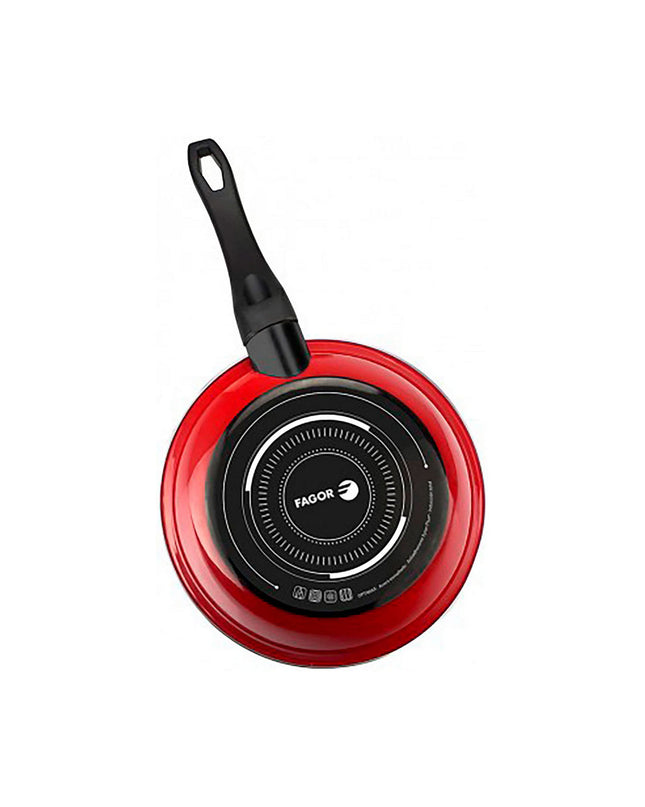 Fagor red cookware set with pots and pans, kitchen and cooking utensils, stacked on a countertop with a modern kitchen background