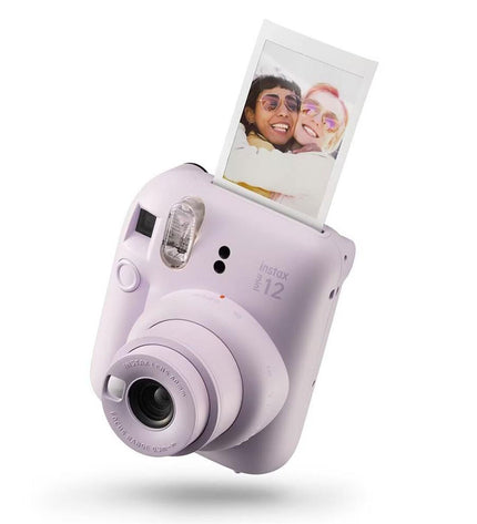 Fujifilm digital camera in purple, compact photography device with lens and control buttons, electronic photography equipment.