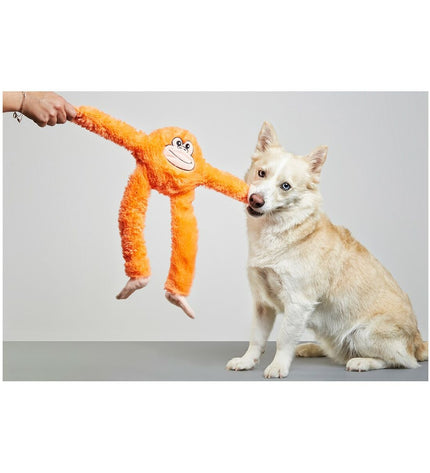 Orange polyester dog plush toy shaped like a monkey from Gloria, designed for dogs to chew and play with.
