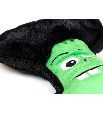 Green Gloria Frankenstein dog plush toy made of polyester and polypropylene, designed for dogs to chew and play with.