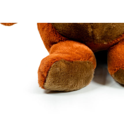 Brown Gloria dog plush toy made of polyester and polypropylene, soft and durable for pets.