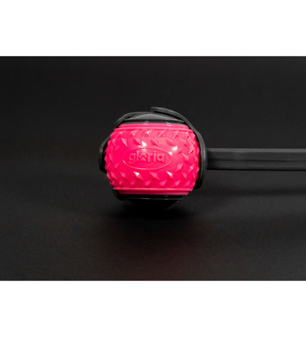 Pink Gloria dog ball launcher made of polypropylene and TPR, designed for interactive play with dogs.