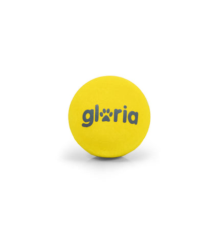 Two Gloria Play and Run yellow foam and TPR dog balls, 4.5 cm diameter, designed for playful pet dogs.