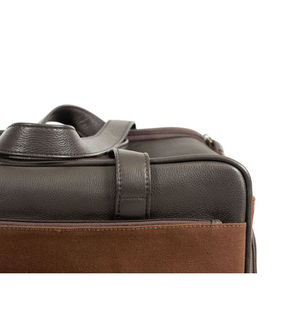 Brown Gloria pet handbag for dogs, featuring a stylish handbag design with pet-friendly interior and sturdy handles.