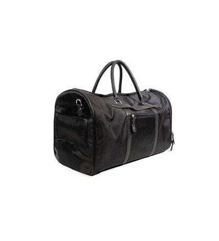 Black Gloria dog pet carrier handbag with sturdy handles and pet access zipper for comfortable transport of small dogs.