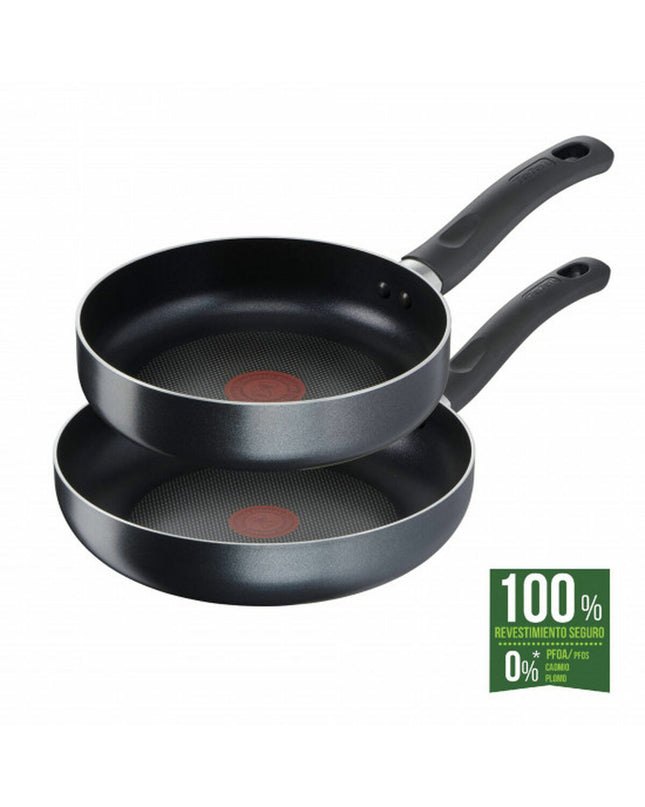 Two Tefal EASY COOK stainless steel pans for home cooking, showcasing their sleek, durable design and polished surfaces.