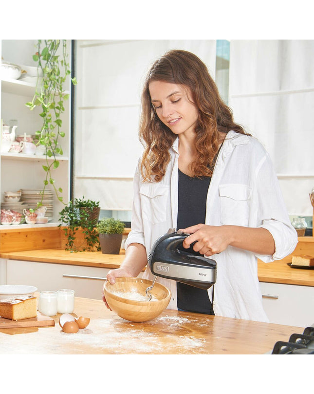 Black & Decker BXMX500E 500W blender and dough mixer on countertop, black compact kitchen appliance for blending and mixing.