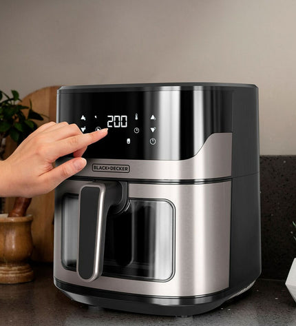 Black & Decker black air fryer BXAF6500E with 1600W power, compact kitchen appliance for healthy frying.