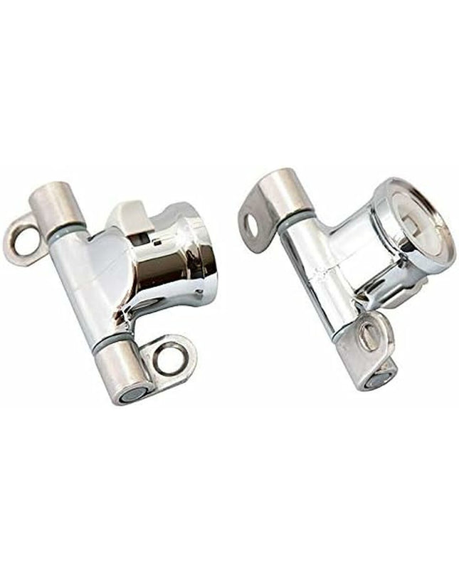 Pair of Roca Dama Senso toilet hinges, durable bathroom hardware for toilet lid and seat installation, in a bathroom setting.