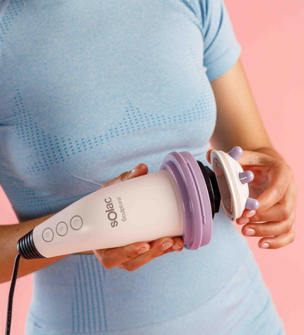 Solac ME7714 Wit massager with 15W power, designed for health and personal care, showing the sleek white device.