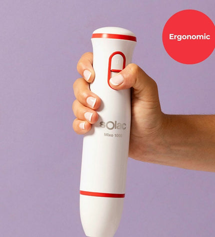 Solac BA5625 hand blender with white and red design, 1000W power, shown with blending attachments for kitchen use