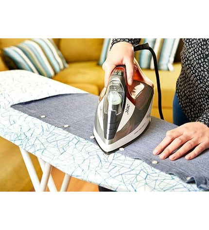 Solac CVG9511 steam iron with ergonomic handle and water tank, designed for household garment ironing and steaming.