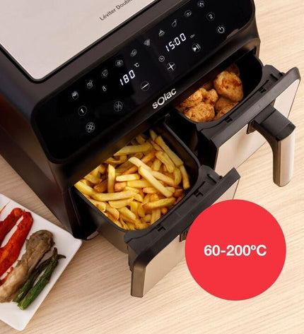 Solac FA1520 black air fryer with 8-liter capacity and 1700W power, suitable for home cooking in a kitchen setting.