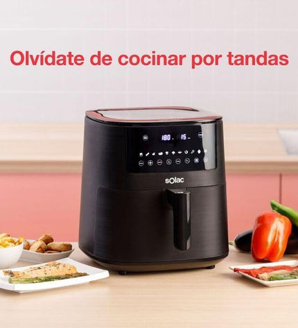 Solac FA1521 black air fryer with 7-liter capacity and 1650W power, compact kitchen appliance for healthy frying.