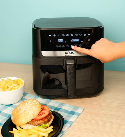 Black Solac FA1801 air fryer, compact kitchen appliance with digital controls, for healthy frying and cooking.
