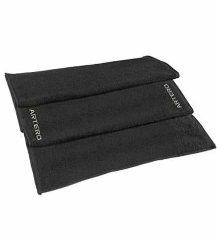 Black Artero hand towel for bathroom and kitchen, soft and absorbent fabric, shown hanging on a towel rack.
