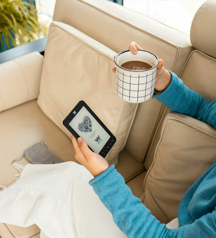 Woxter EB26-069 black eBook reader with buttons and screen, electronic device for digital reading.