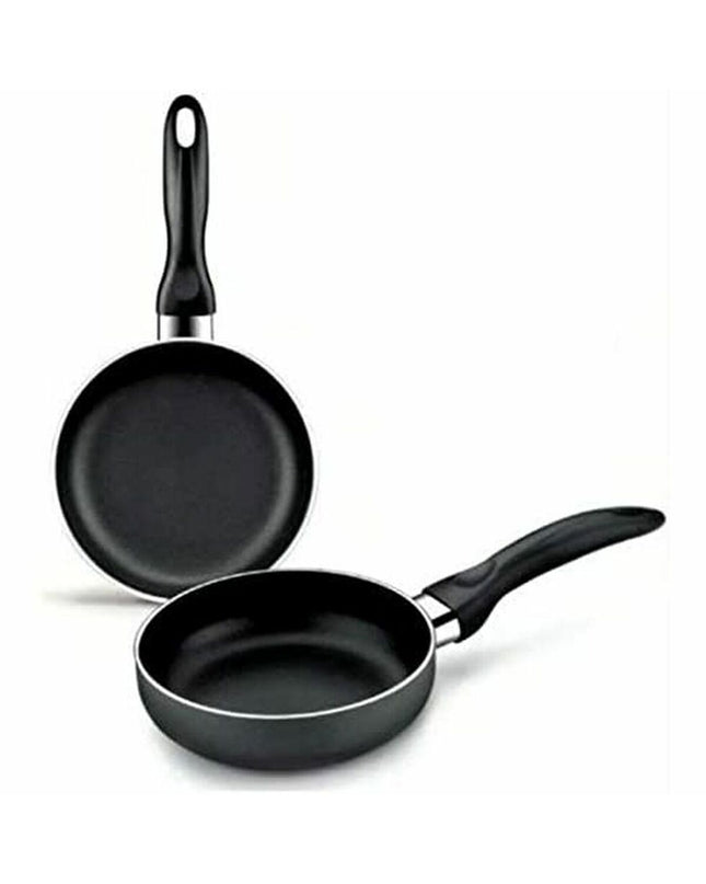 Black Monix M681200 aluminum pan for cooking and household use, shown with a smooth, non-stick surface and ergonomic handle.