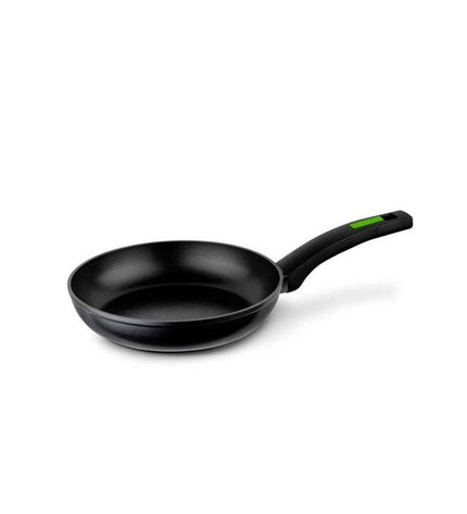Monix Green 18cm metal pan with black and green design, aluminum body and Bakelite handle, suitable for house and kitchen use.