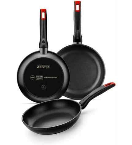 Monix PRO Zwart cookware set with three black pans for home cooking, featuring non-stick surfaces and ergonomic handles.