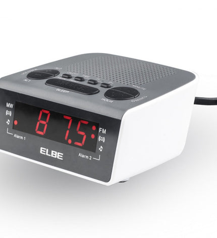 ELBE CR-932 AM/FM radio alarm clock in white with digital display and control buttons on top.