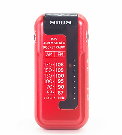Aiwa R22RD transistor radio toy with colorful buttons and vintage design, displayed on a white background.