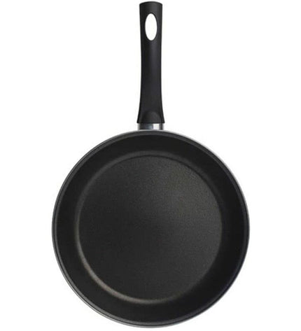 Black San Ignacio Valencia 22 cm metal pan for cooking, shown with a smooth interior and sturdy handle.