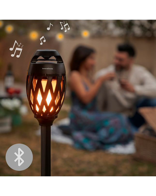 InnovaGoods draadloze speakerphone with LED-vlameffect, designed for outdoor garden decor and outdoor entertainment.