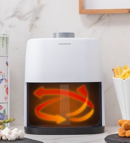 InnovaGoods Fryinn Lite 2000 white air fryer with 2L capacity and 1200W power, shown on a kitchen countertop.