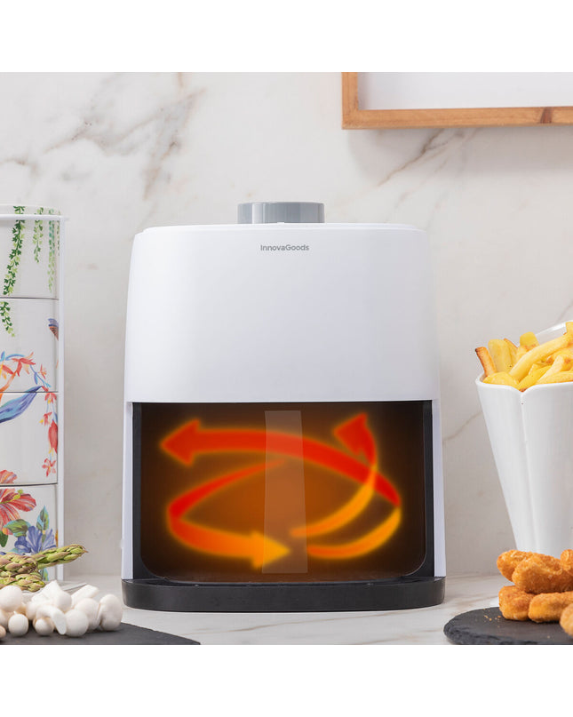 InnovaGoods Fryinn Lite 2000 white air fryer with 2L capacity and 1200W power, shown on a kitchen countertop.