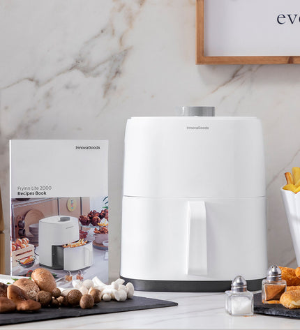 InnovaGoods Fryinn Lite 2000 white air fryer with 1200W power and 2L capacity for home cooking.