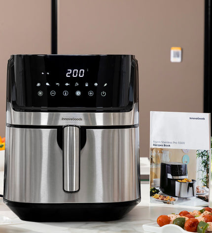 InnovaGoods Fryinn Pro 5500 black air fryer with stainless steel finish, 1700W, compact design for home cooking.