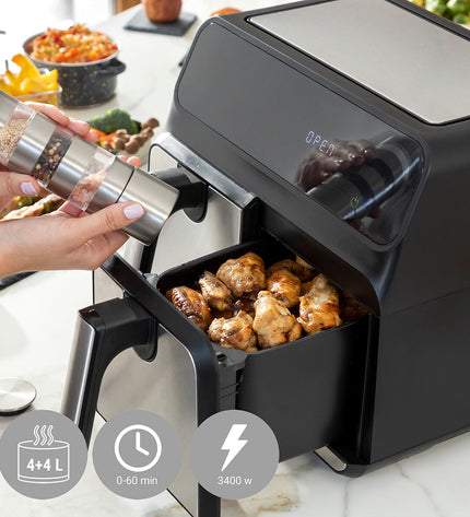 InnovaGoods Fryinn Double air fryer with black finish, 8L capacity, stainless steel exterior, 3400W for home cooking.