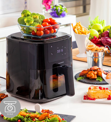 InnovaGoods Fryinn Balance 5000 black air fryer with stainless steel basket, 1500W, 5L capacity for home cooking.