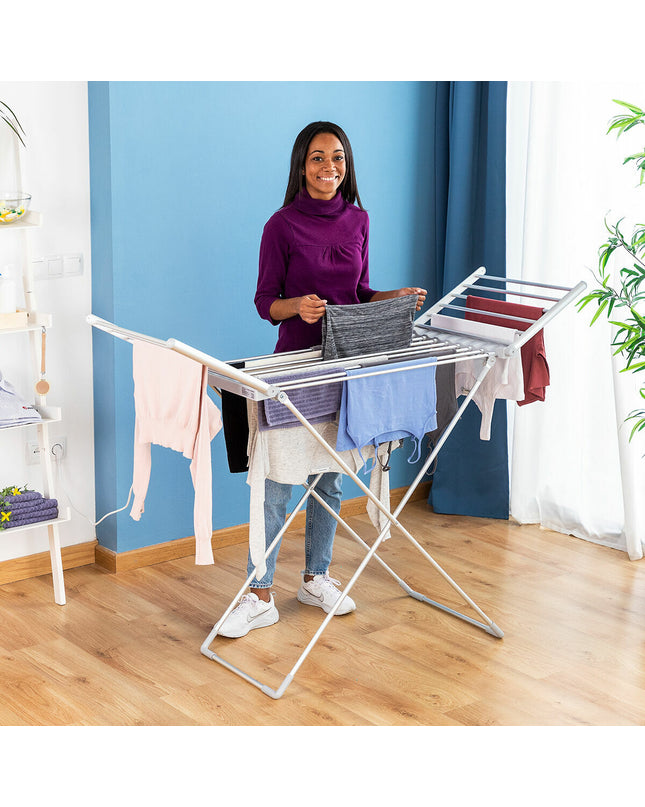 InnovaGoods electric foldable drying rack with winged design, 230W motor, black finish, perfect for kitchen and laundry storage.