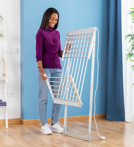 InnovaGoods electric foldable drying rack with wings, 20 bars, 230W, for household laundry and kitchen storage.