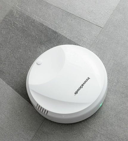 InnovaGoods slimme robotstofzuiger voor huis schoonmaken, met roterende borstels en compacte ontwerp voor vloeren en ramen.