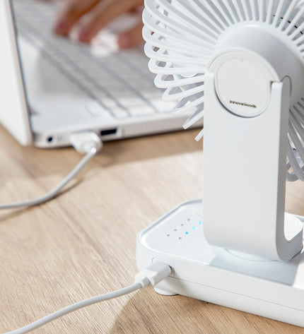 InnovaGoods rechargeable desk fan with 5.4-inch blade, 3600mAh battery, portable air conditioning for home and office use.