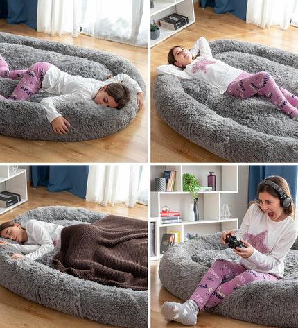 Large grey human dog bed by InnovaGoods with plush fabric and spacious design for comfortable lounging.