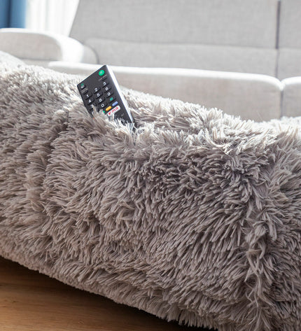 Large grey human dog bed by InnovaGoods, cozy and plush with soft fabric, designed for comfortable relaxation.