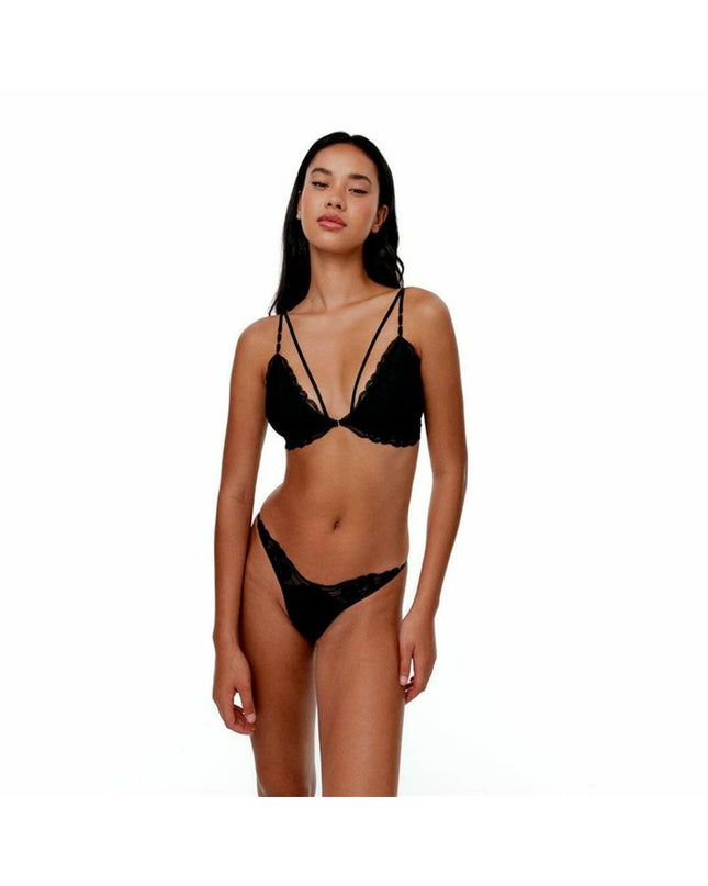 Black Limba Mojave triangular bikini top in black for watersport and outdoor activities, shown on a model.