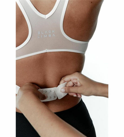 Black Limba women's sport top for fitness and dance, black athletic top with breathable fabric and sporty fit.