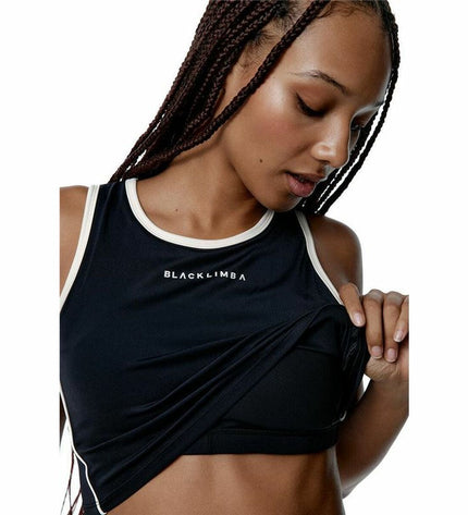 Black Limba women's sport top for dance and fitness, black streamline design, breathable athletic wear for active women.