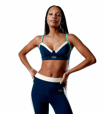 Black Limba women's black and blue sport top, ideal for fitness and outdoor dance activities, shown on a model.